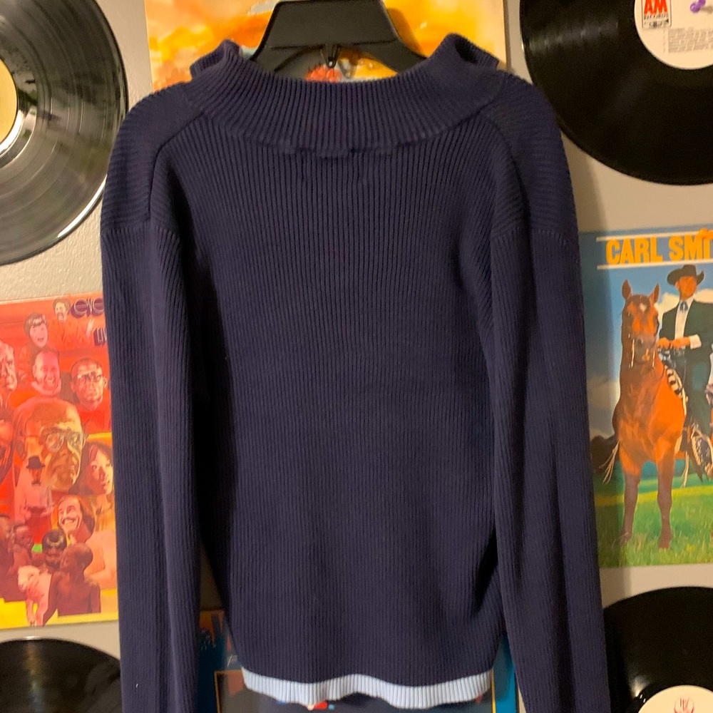 Navy blue/baby blue zip half placket shirt.